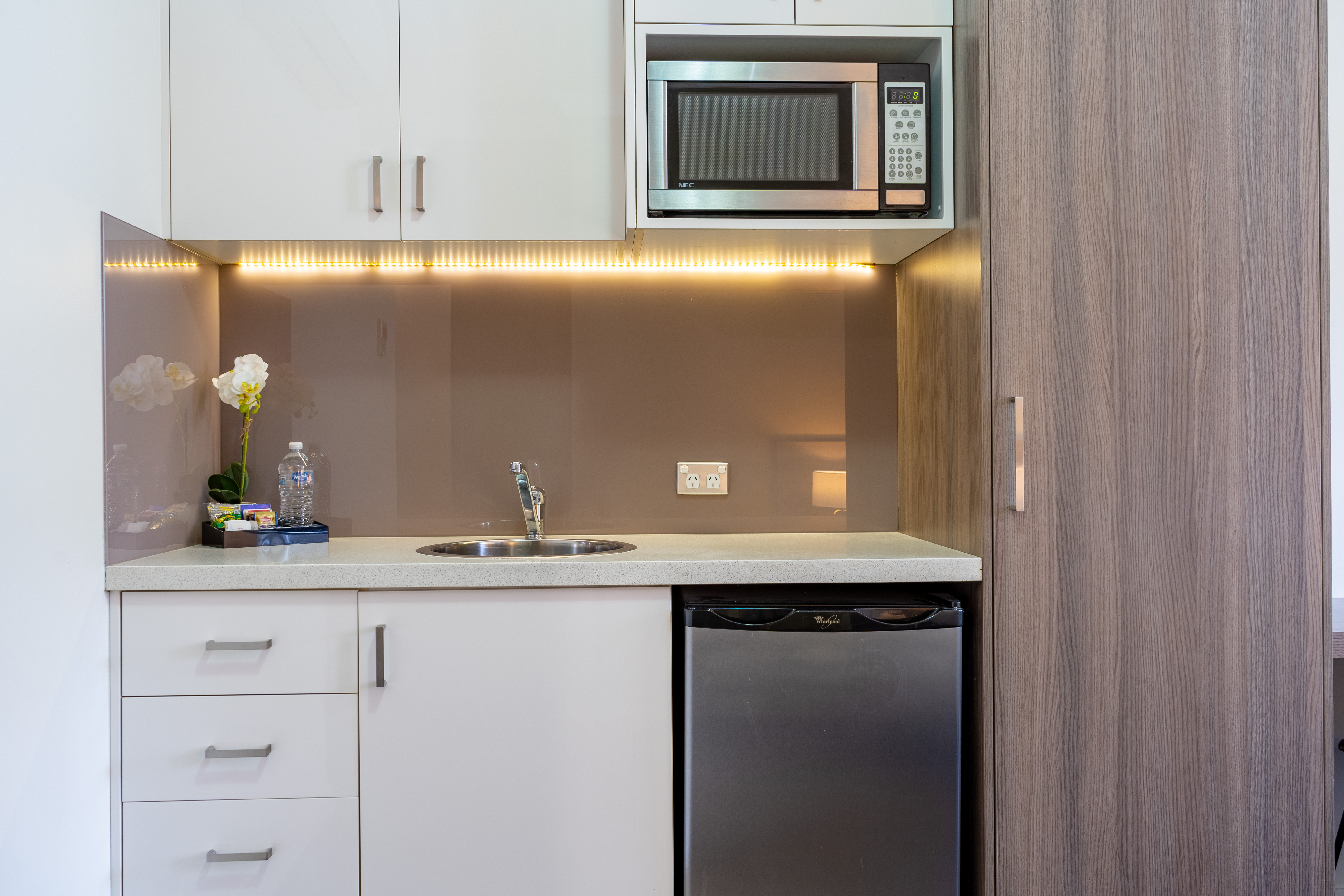 Compact kitchenette in the Queen Room at BW Plus Camperdown Suites Sydney